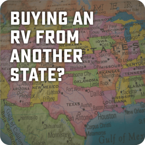 Person holding a checklist titled ‘Questions to Ask Before Buying an Out-of-State RV’ next to an RV
